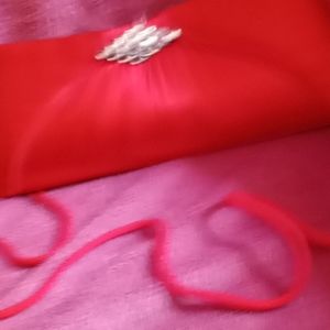 Red silk with rhinestone.Sachel